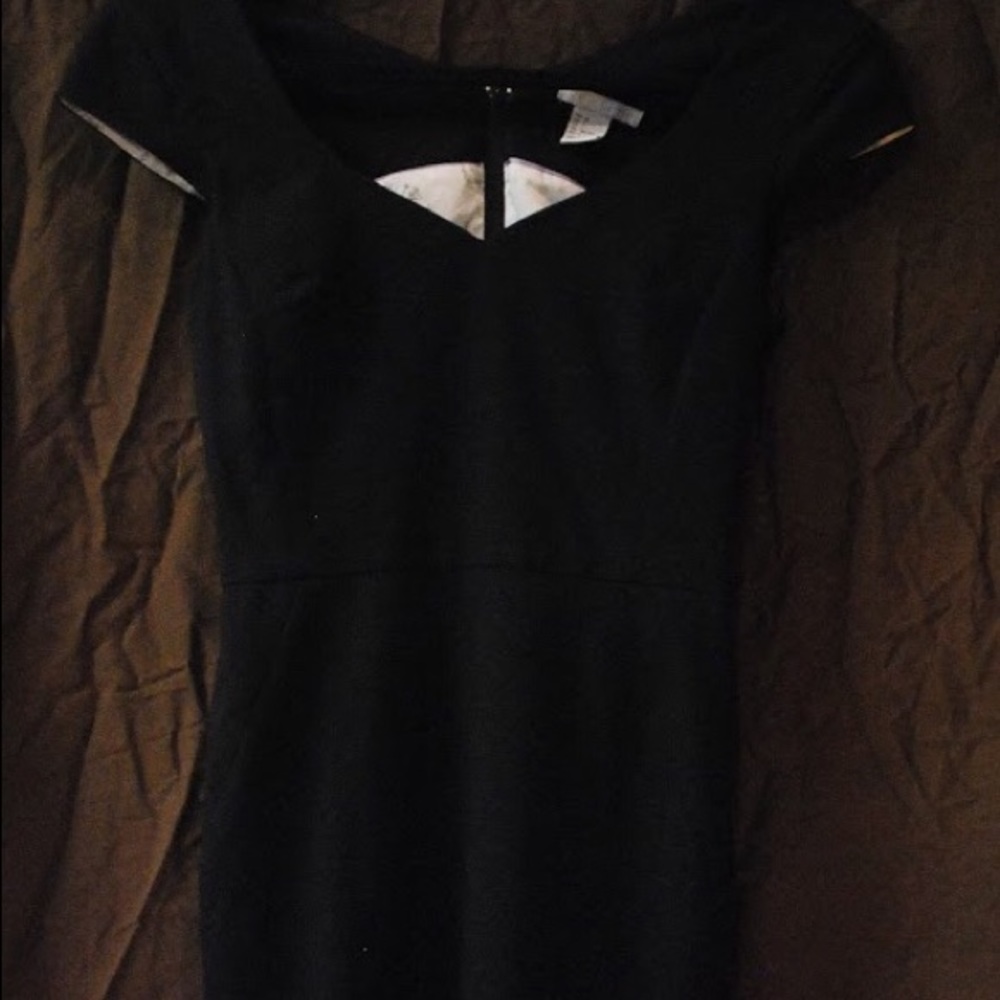 Form fitting tight black dress